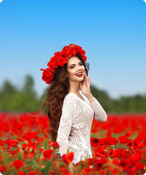 Woman wearing a red poppy crown